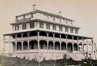 original historic hotel with wide wood verandas