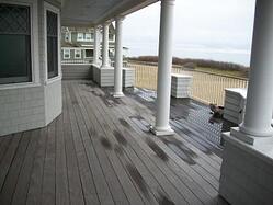 5/4x6 Cumaru decking with hidden fasteners by the water