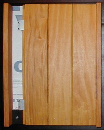 Garapa vertical wood siding using Climate Shield rainscreen wood siding clips