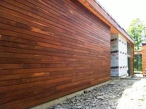 Ipe cladding in Climate Shield rainscreen wood siding installlation