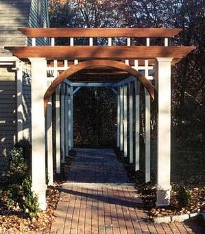 Ipe arched arbor creates welcoming entrance to garden