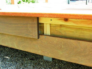Ipe deck boards were selected for the fascia trim to cover the deck's rim joists