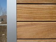 close_up_of_corner_detail_using_cumaru_hardwood_siding_and_climet-shield_aluminum_corner_system_a