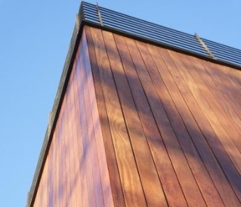 Climate-Shield rain screen system with architectural wood cladding
