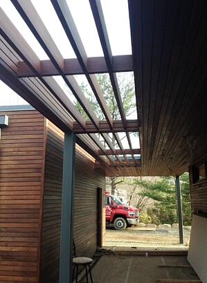 Ipe wood pergola attached between two outbuildings