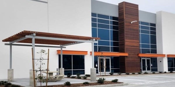 Ipe Wood Siding Design Transforms a Cold Commercial Exterior