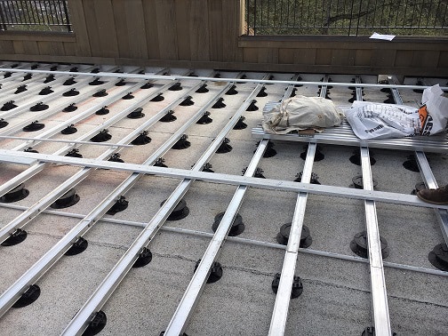 Adustable rooftop deck pedestals and aluminum deck joists - Copy