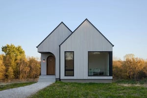 Arbor Wood thermally modified brushed pine cladding with white oil finish