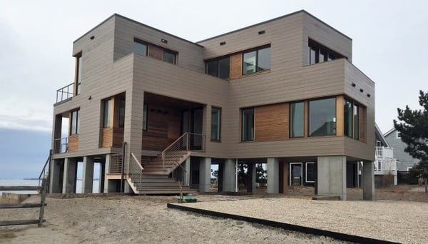 Cedar siding on a beachfront home with Climate-Shield rainscreen system