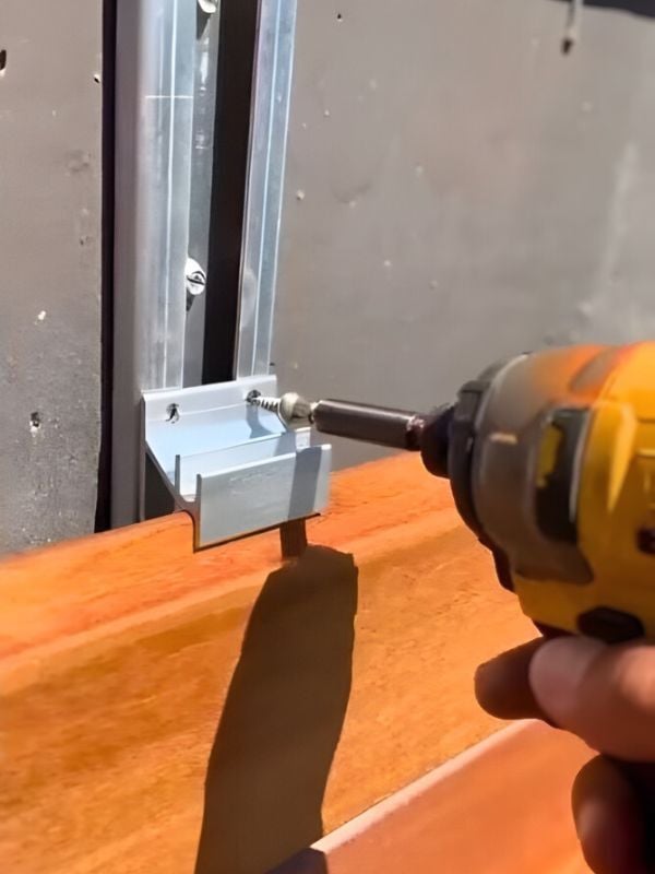 Mataverde Climate-Shield Wood Rainscreen Siding vertical install image with power drill Mataverde Climate-Shield Wood Rainscreen Siding vertical install image with power drill