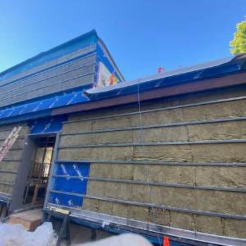 Climate-Shield Wood Rainscreen being installed on restaurant exterior 36KB