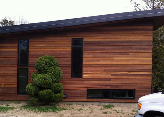 Red Cumaru hardwood rainscreen siding installation