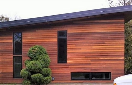 The angled rooftop on this house exterior allows those Cumaru colors to shine. Rainscreen installation will not cover up the architectural details.