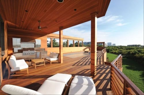 Cumaru siding, soffits and rooftop deck by Mataverde Decking