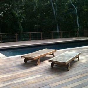 Cumaru wood pool deck and custom lounge chairs