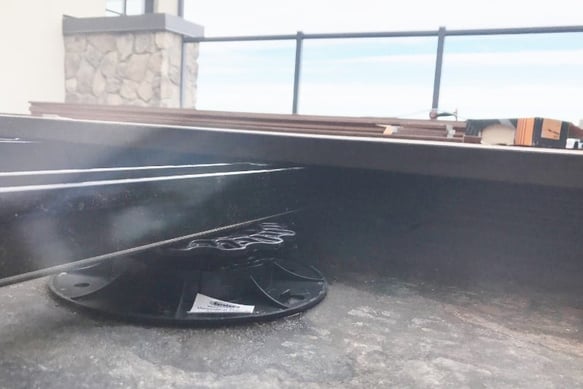 Eurotec adjustable deck pedestal, click foot adapter and aluminum system profile create a great deck frame for rooftop decks