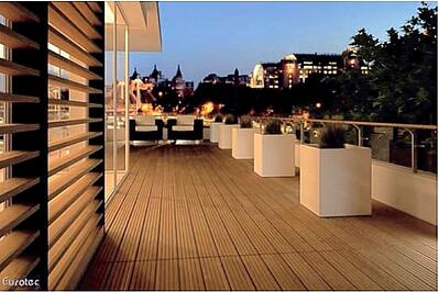 A modern rooftop deck built with a Eurotec® Rooftop Deck System from Mataverde Sustainable Decking and Siding Solutions.