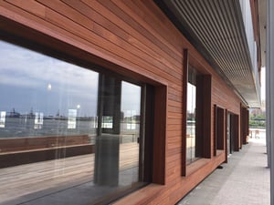 FSC Certified Jatoba rainscreen siding on storefront