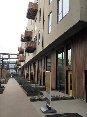 FSC Machiche rainscreen and balcony decks on apartments