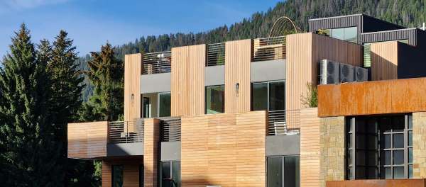 Garapa Rainscreen upper floors contrast Vertical siding Sun Valley, ID, commercial and residential custom showroom and apartments 27KB