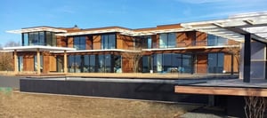 Garapa hardwood rain screen siding graces new home in the Hamptons