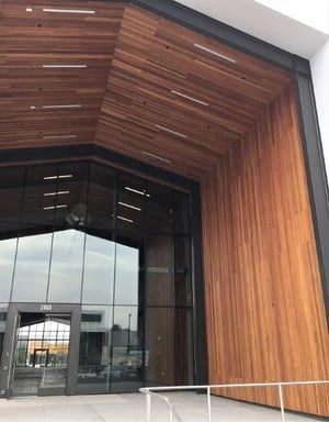 Garapa vertical rainscreen and soffits at entrance