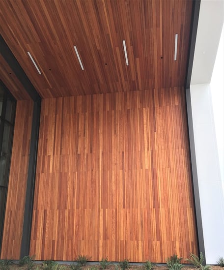 Garapa vertical rainscreen and soffits