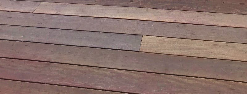 Hardwood decking cupping- moisture below and sunlight above creates imbalance causing wood to move
