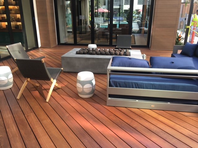Ipe decking outdoor room with firepit on a rooftop deck