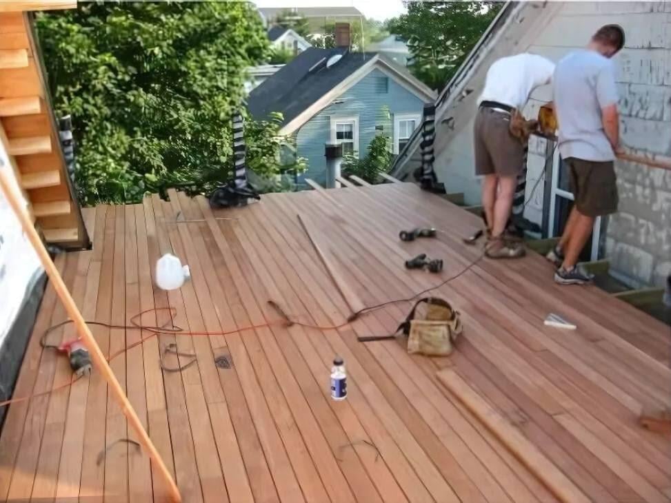 Mataverde Ipe wood small rooftop deck under construction with sleepers 