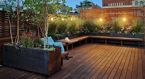 Ipe hardwood deck with built-in seating, planters and privacy screening