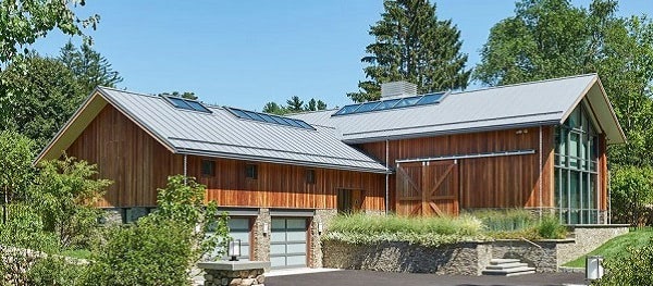Ipe hardwood rain screen system on modern barn-3