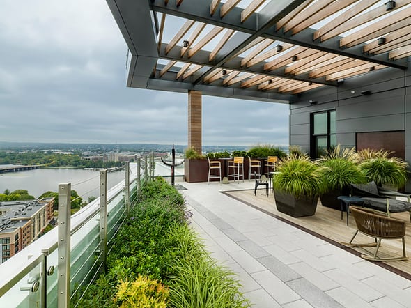 Ipe hardwood rooftop with contemporary two color pergola
