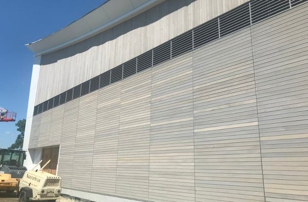 Ipe vertical and horizontal siding under construction at Providence College