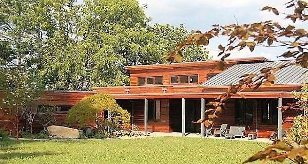 Ipe wood rainscreen and pergola design by Mataverde Decking and Siding