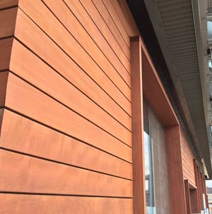 Jatoba hardwood rainscreen siding and window trim detail closeup