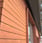 Jatoba hardwood rainscreen siding and window trim detail closeup