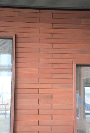 Jatoba rainscreen siding with geometric pattern-1