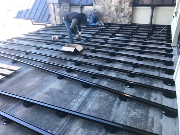 Laying out the Eurotec Profi-line adjustable deck pedestals with the aluminum system profile joists