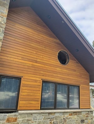 Machiche hardwood rainscreen on residence