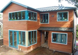 Machiche wood rainscreen on residence