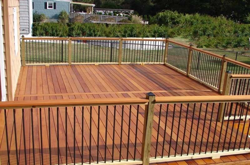 Mataverde Garapa wood deck, railing and steps with a Penofin  hardwood UV protectant finish, backyard deck