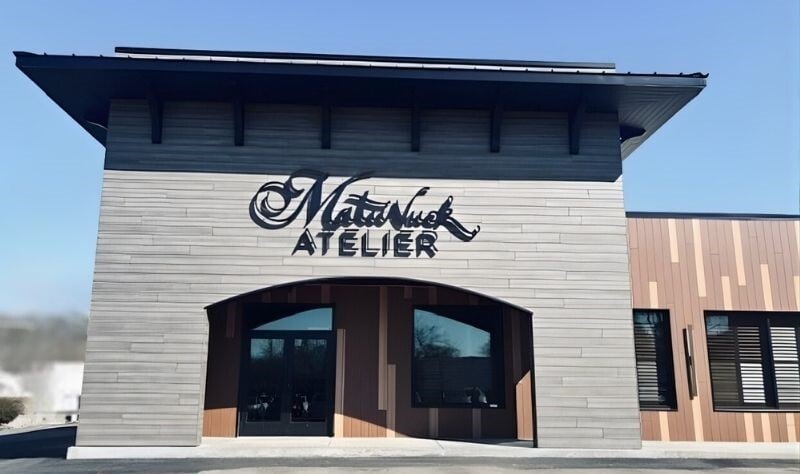 Matunuck Atelier and Market Entrance in Mystic Cedar Wood Décor and building in Tropical Ipe décor with Western Red Cedar décor accents - Trespa from MataverdeDecking.com