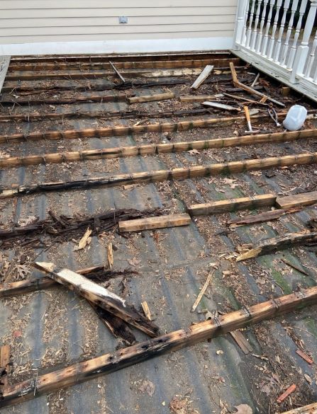 McDonald AL rooftop deck decayed wood sleepers