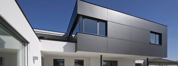 Trespa Pura siding in Lumen Metropolis black on a modern private home