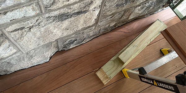 Mohonk balcony scribing on Jatoba and stone wall