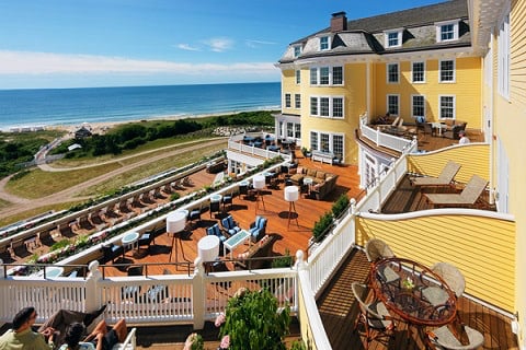 A view from above of the multiple deck levels made of Ipe hardwood at the Ocean House hotel in Rhode Island