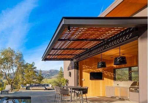 Mataverde SaferWood outdoor kitchen with ThermaWood FR hemlock fire treated ceilings and soffits and exterior vertical siding