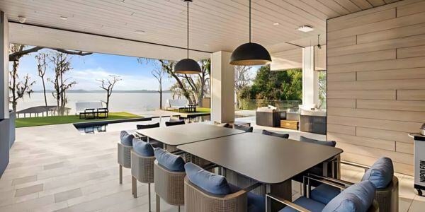 Pura NFC Siding by Trespa Aged Ash Decor on exterior and soffits of a large porch