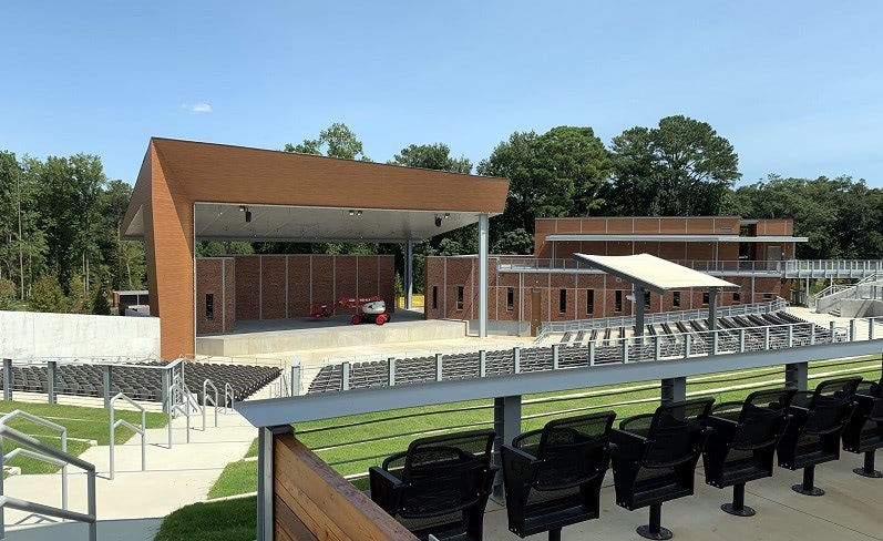 Pura NFC siding Romantic Walnut wood decor installed Stockbridge Amphitheater